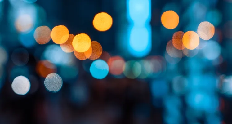 Our brochure blurred lights image Our brochure blurred lights image