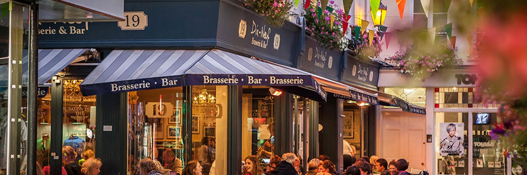 People sat outside a cafe